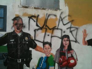 "My neighborhood does not like the police." (courtesy Luis H. Moreno, Ph. D http://luishmoreno.com/)